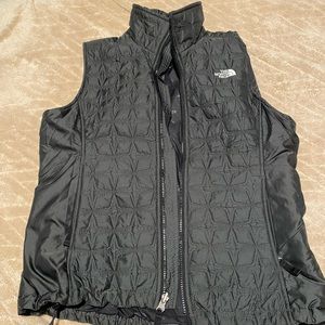 North Face grey light puffy zip up vest size medium